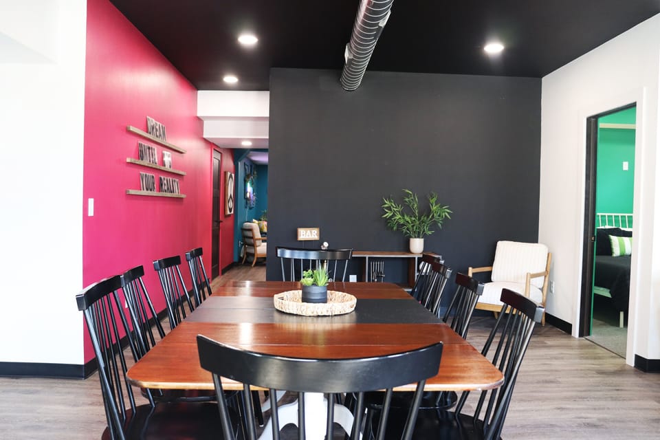 The living area is designed for relaxation and socializing, boasting ample seating and a cozy atmosphere. 