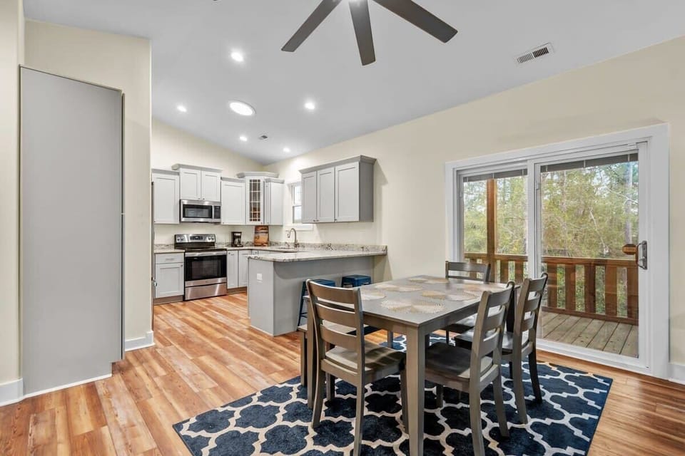 Dining Table and Kitchen Area