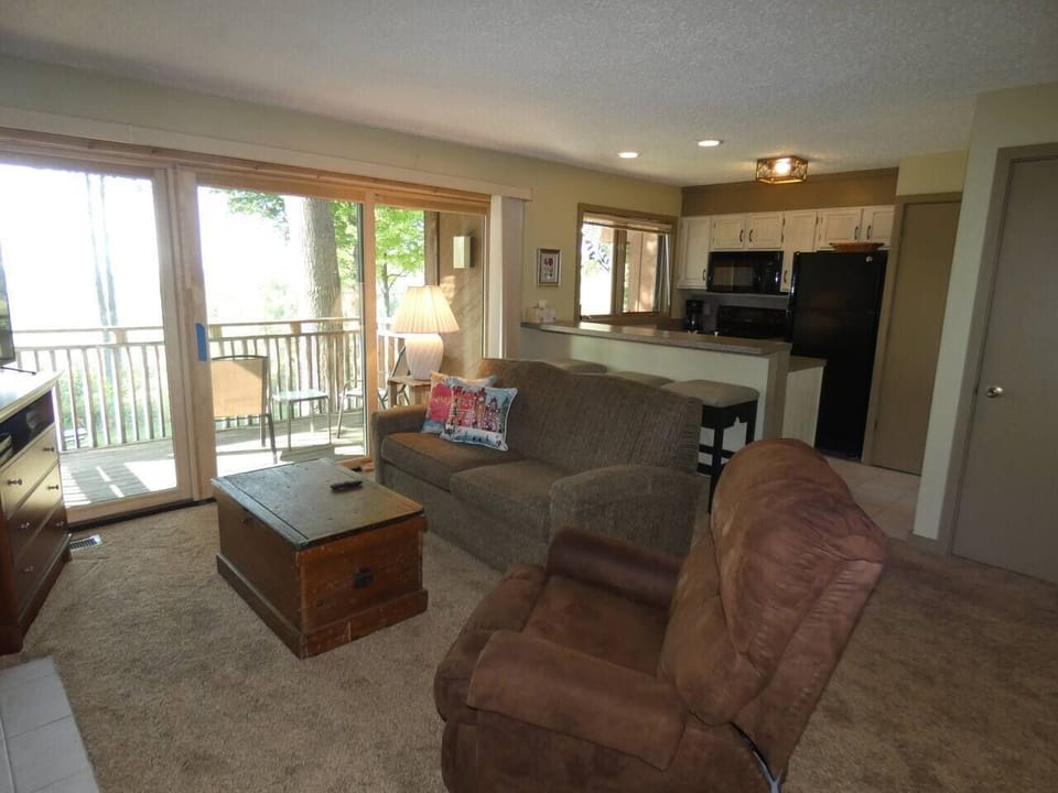 Living area looking out to deck.