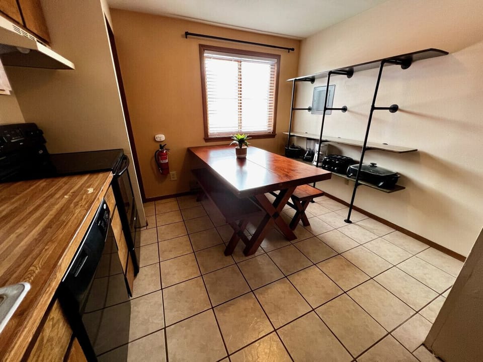 Unit 1 Dining area includes a lot of shelf space for all of your items from home.