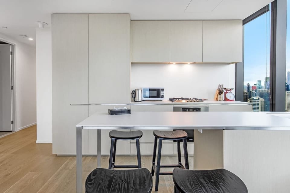 The modern kitchen has everything that’s needed to prepare meals at home, including a dishwasher for easy clean-up and seating at the kitchen island. 
