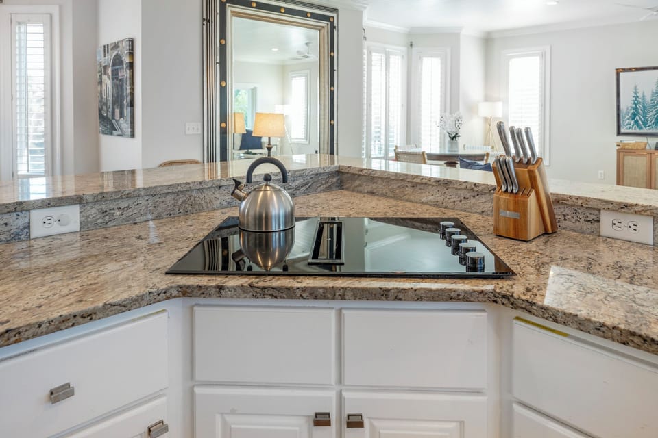 Kitchen stove overlooking the living room.