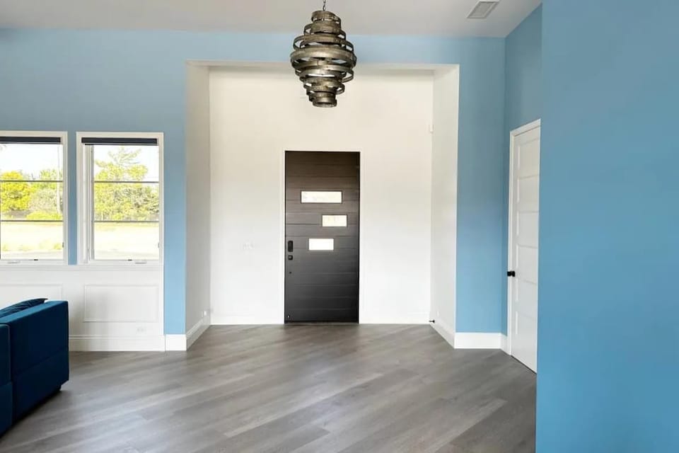 Our entryway chandelier was crafted by a local artist from wine barrel bands