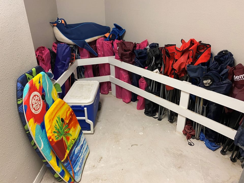 Grab some chairs and sand toys from the storage closet and head to the beach