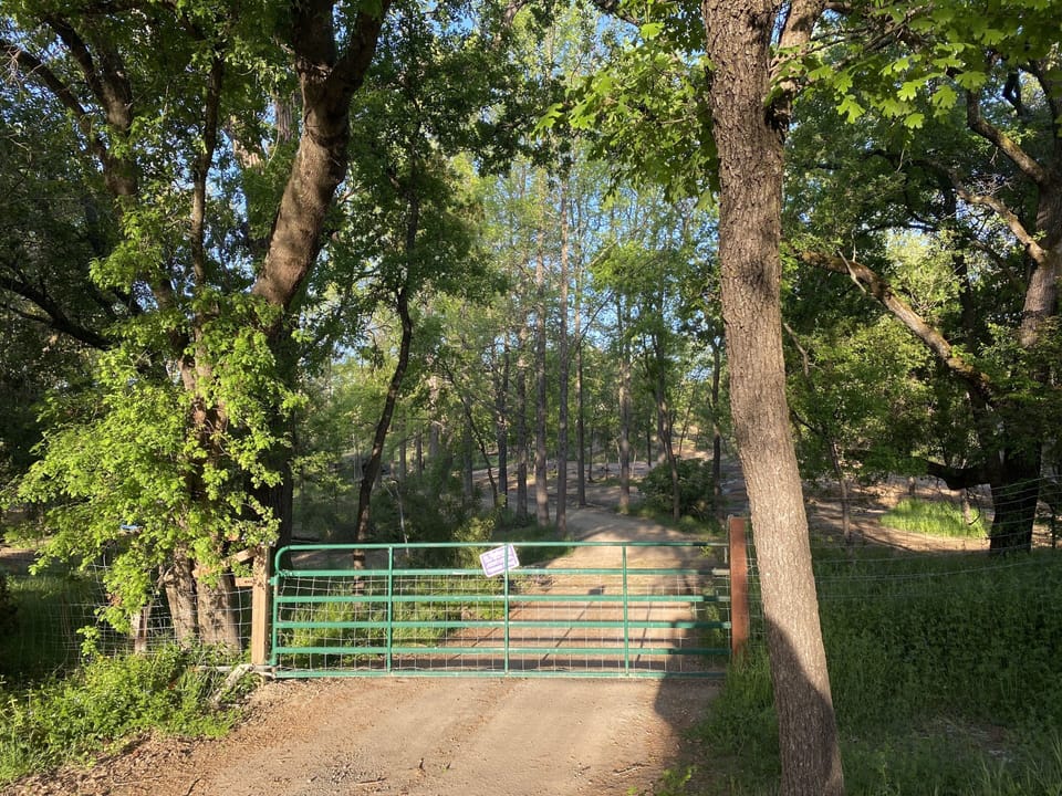 Green Gate leading to 10 peaceful acres at the Bonanza Barn Retreat!
