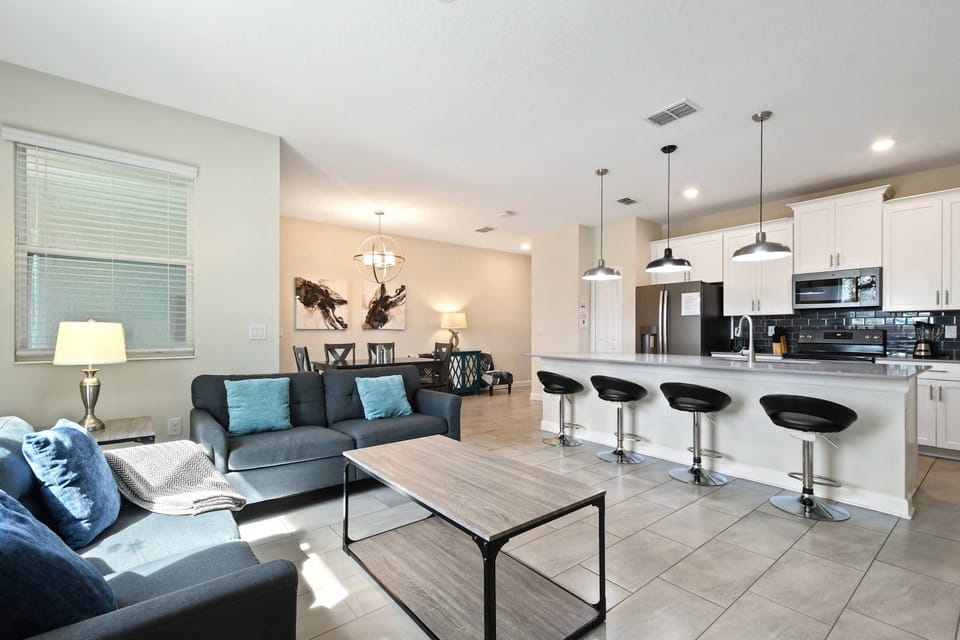 Make yourself at home in this comfortable living room, perfect for lounging and enjoying leisurely moments.