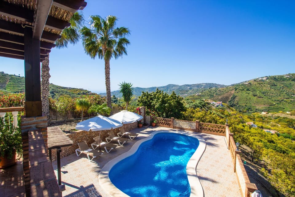 Sunbath on the patio and enjoy the mountain views