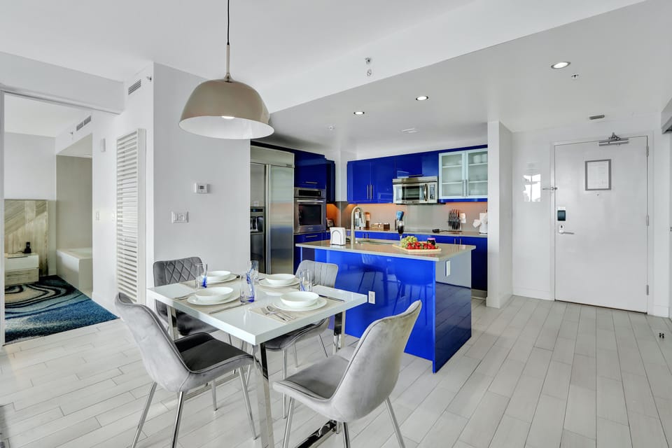 Dining Area | Lends a warm welcome + offers an open concept layout into living and kitchen areas.