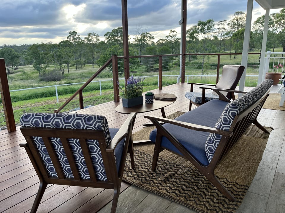 Comfy lounge and chairs to laze the day away. All under the 9m x 4m covered deck