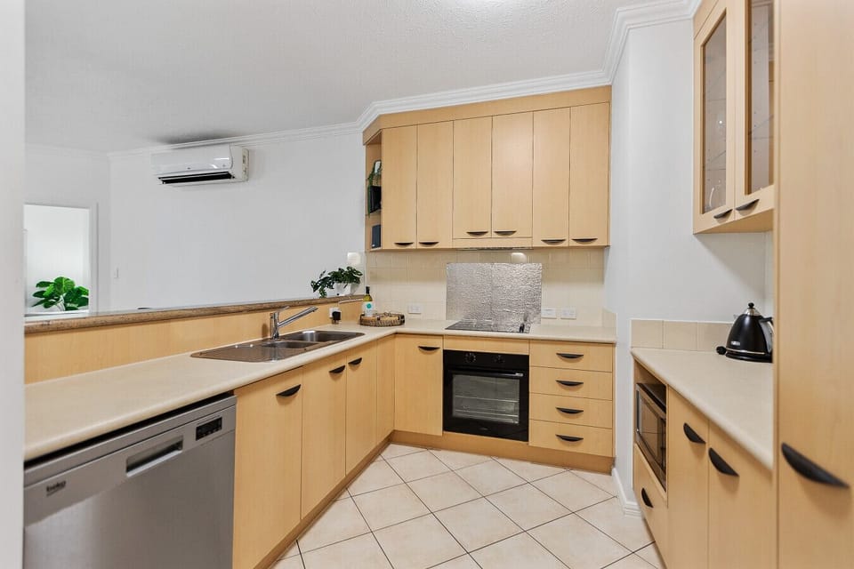 Cook comfortably in the fully equipped kitchen, complete with modern appliances and thoughtful touches.