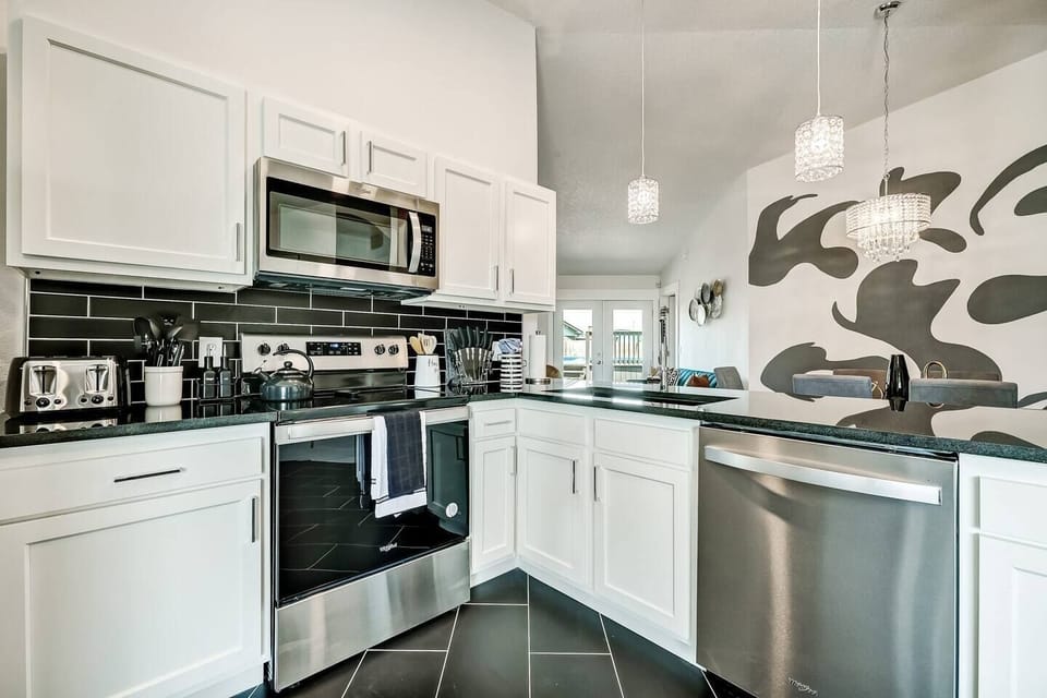 From the kitchen, enjoy a seamless sightline to the entire living area.