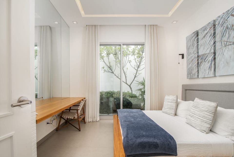 Bedrooms with their ensuite bathrooms.