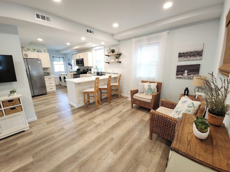 Living Room and Kitchen space with seating and TV