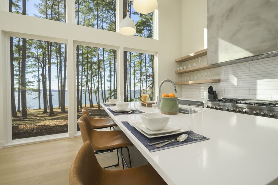 Kitchen Oasis: Stunning views of the lake and pines await your culinary adventures!