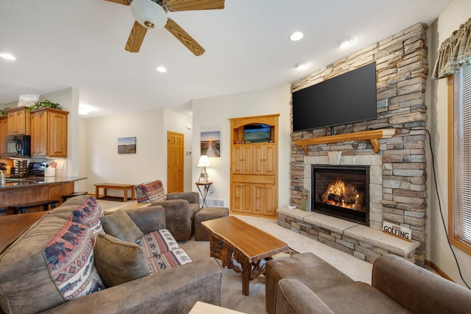 Unwind in cozy comfort. Let the warmth of the fire melt your worries away.