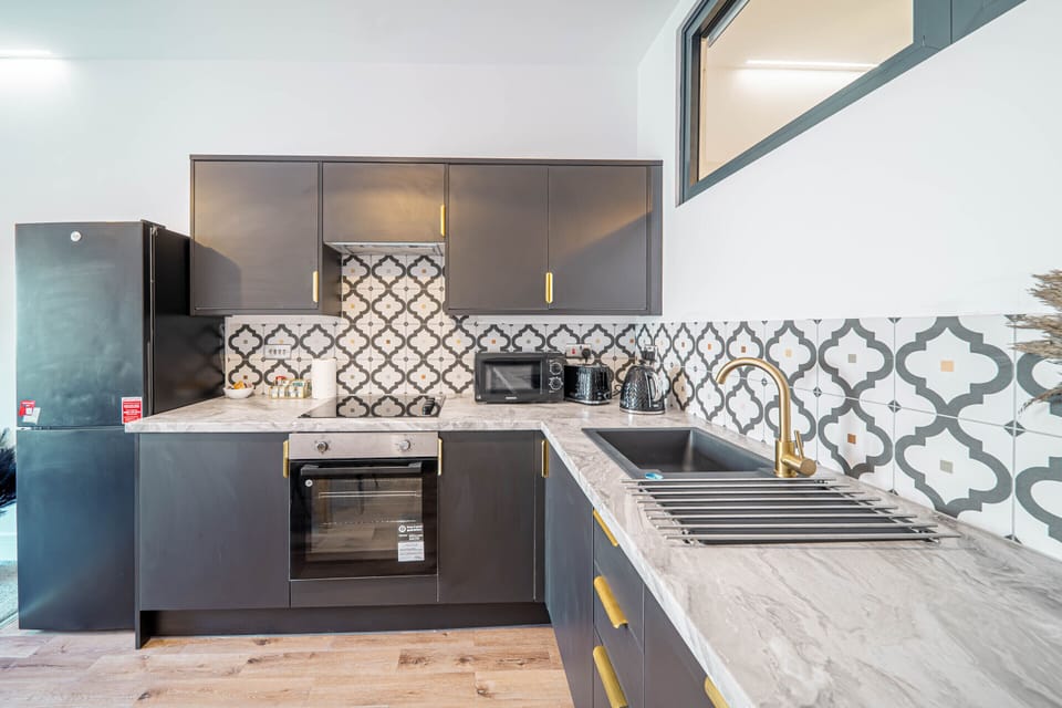 Modern kitchen with everything needed for short or long stays