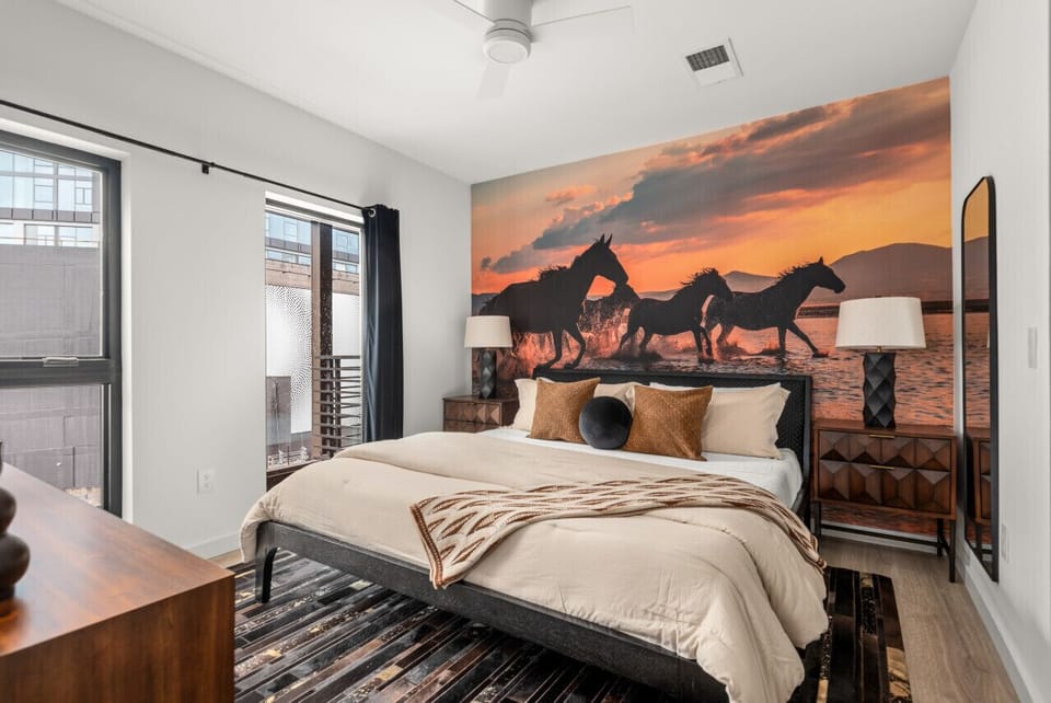 Bedroom: King-size bed with smart TV and ensuite bathroom.