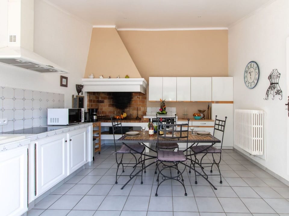 Furniture, Cabinetry, Countertop, Building, Kitchen, Table, Kitchen Appliance, Chair, Home Appliance, Kitchen Stove