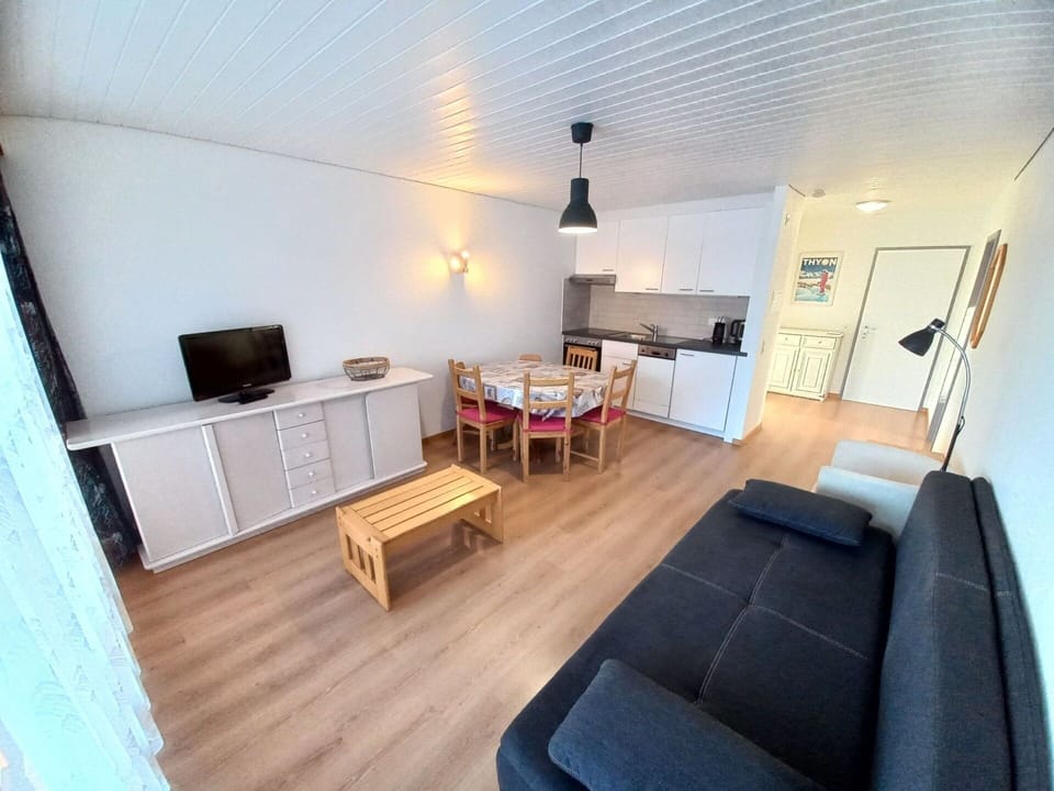 Furniture, Couch, Table, Lighting, Interior Design, Comfort, Building, Floor, Flooring, Wood
