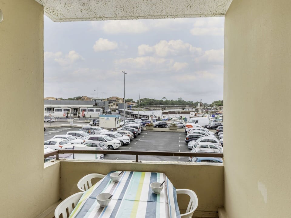 Cloud, Property, Sky, Window, Building, Shade, Watercraft, Boat, Vehicle, Condominium