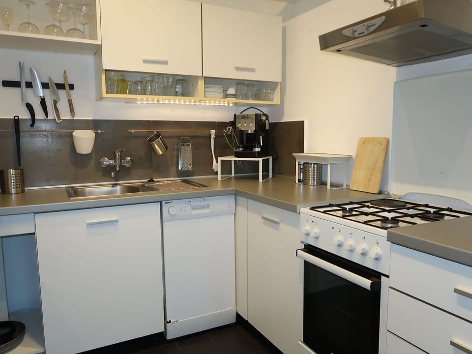 Cabinetry, Kitchen Sink, Countertop, Sink, Kitchen Stove, Kitchen Appliance, Kitchen, Tap, Home Appliance, Lighting