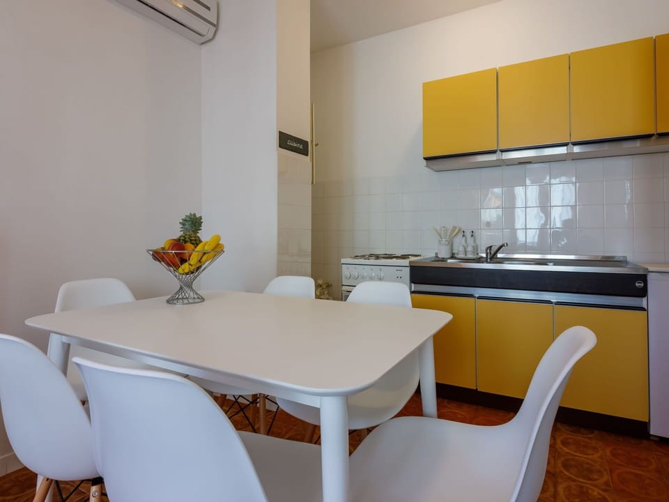 Furniture, Cabinetry, Property, Table, Countertop, Chair, Kitchen Sink, Sink, Building, Orange