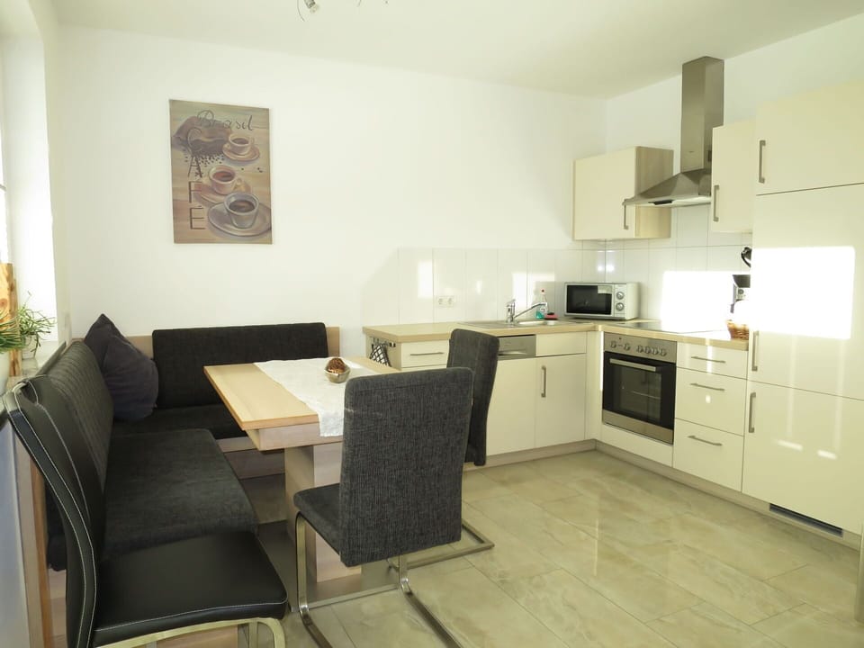 Cabinetry, Property, Furniture, Countertop, Building, Table, Plant, Kitchen Appliance, Kitchen Stove, Chair