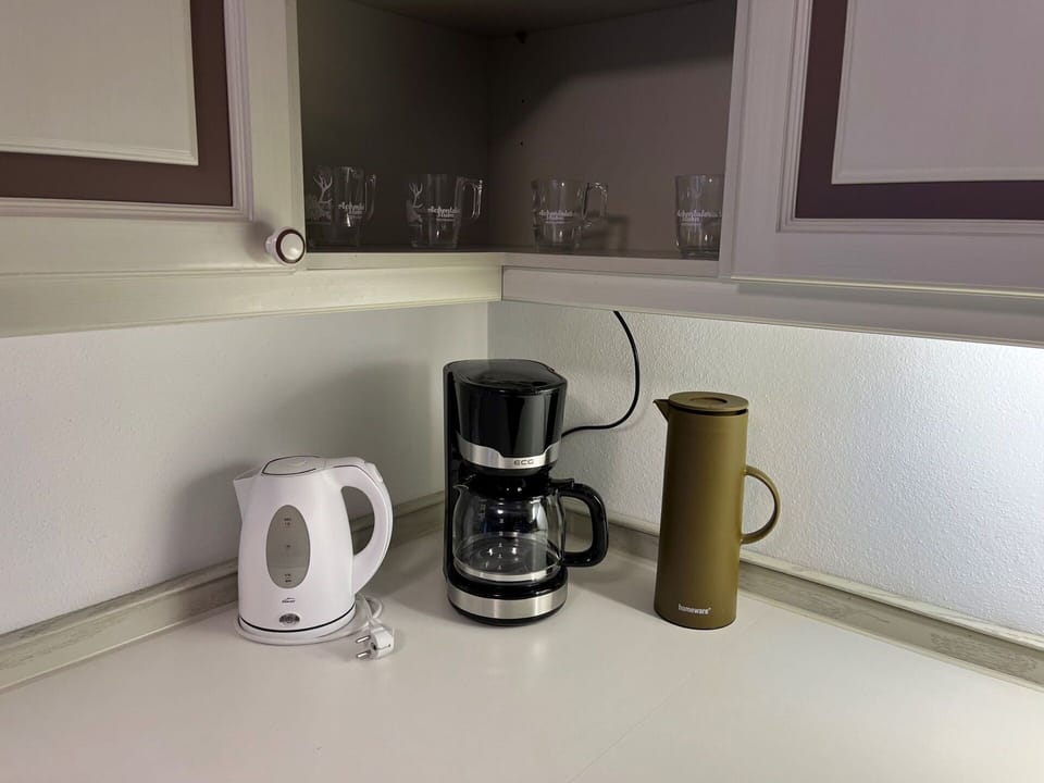 Tableware, Drinkware, Cup, Serveware, Interior Design, Wall, Kitchen Appliance, Coffee Cup, Flooring