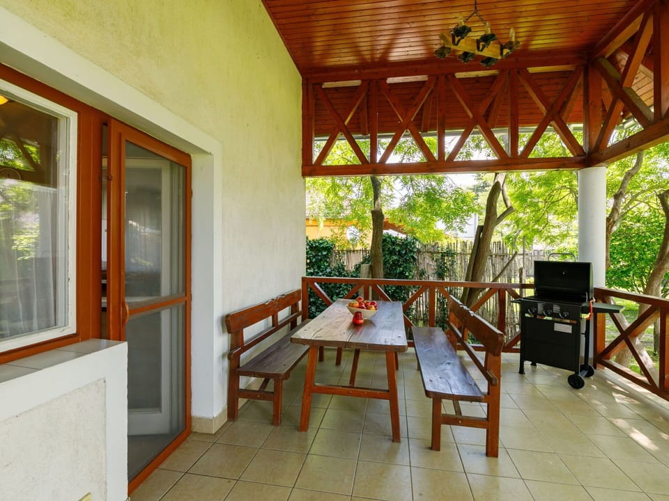 Furniture, Property, Window, Building, Table, Plant, Wood, Interior Design, Shade, Houseplant