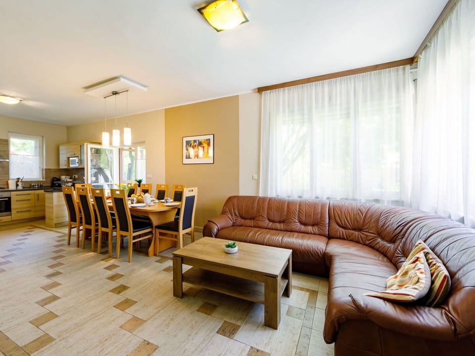 Table, Furniture, Property, Couch, Wood, Lighting, Interior Design, Comfort, Yellow, Flooring