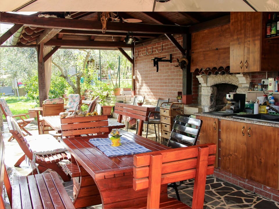 Furniture, Property, Table, Cabinetry, Plant, Countertop, Wood, Chair, Outdoor Furniture, Interior Design