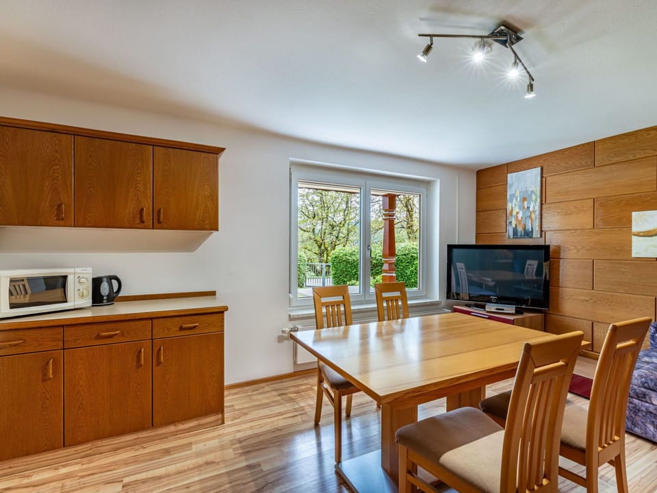 Furniture, Cabinetry, Property, Table, Countertop, Chair, Wood, Home Appliance, Interior Design, Lighting