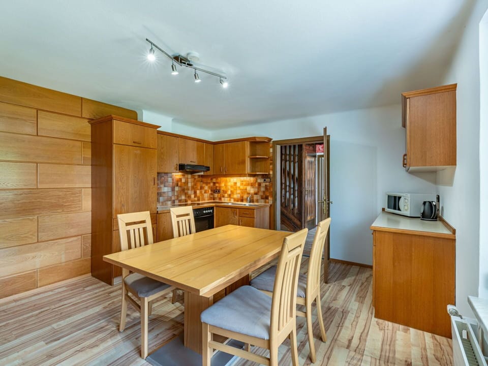 Furniture, Table, Property, Cabinetry, Wood, Chair, Lighting, Interior Design, Flooring, Floor