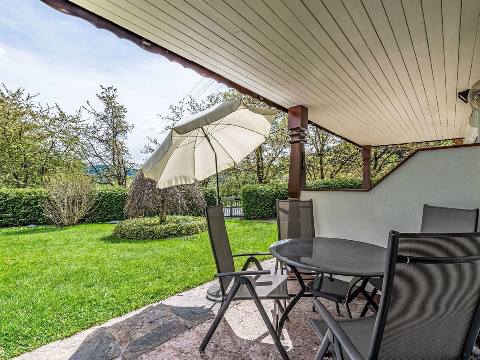 Property, Furniture, Plant, Shade, Chair, Outdoor Furniture, Umbrella, Building, Tree, Table