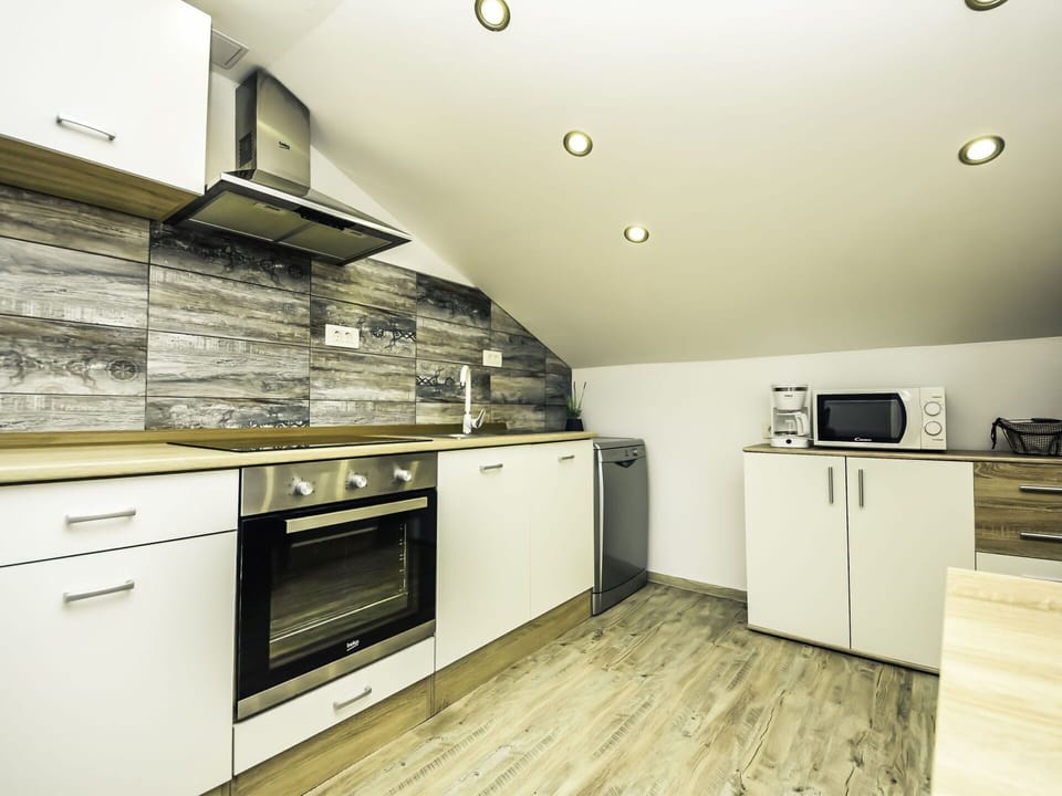Cabinetry, Countertop, Furniture, Building, Kitchen Stove, Kitchen Appliance, Kitchen, Drawer, Wood, Interior Design