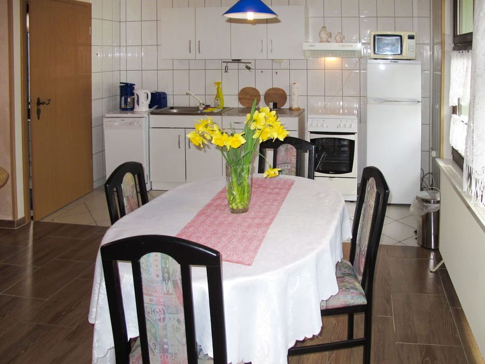 Flower, Table, Furniture, Cabinetry, Vase, Product, Chair, Interior Design, Flooring, Tablecloth