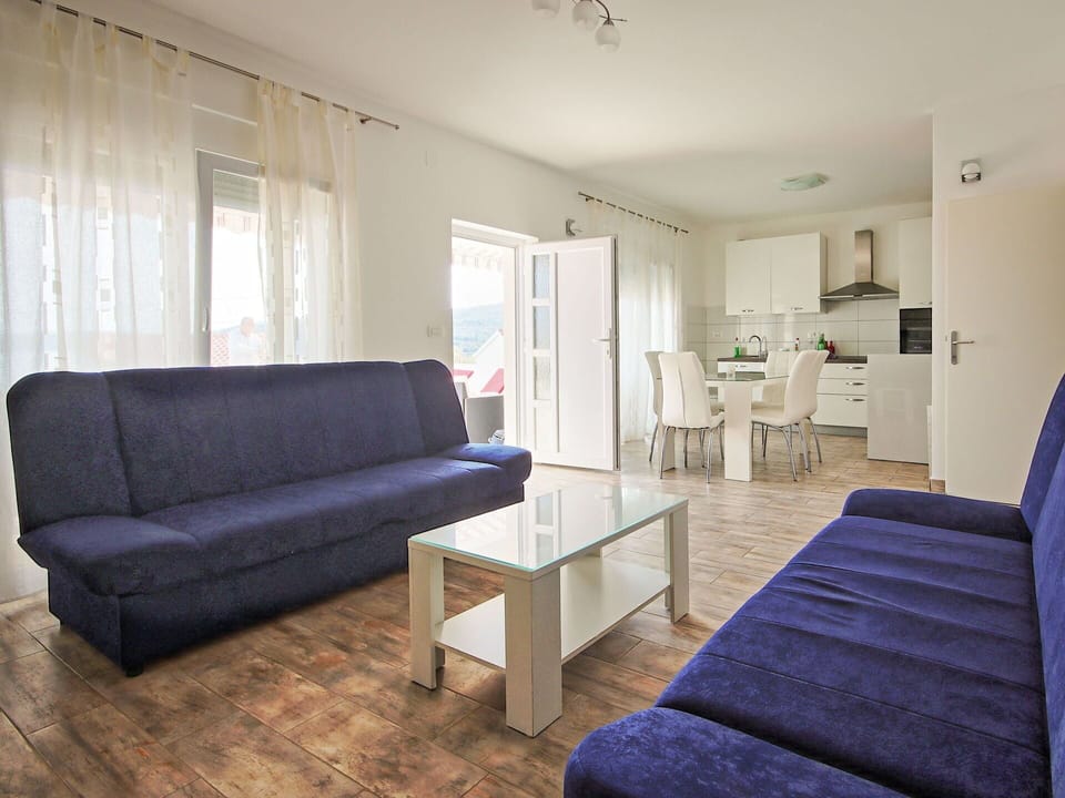 Furniture, Couch, Comfort, Blue, Wood, Interior Design, Table, Floor, Flooring, Living Room