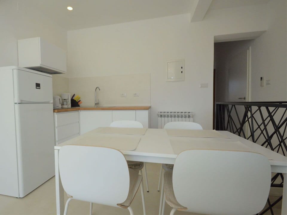 Water, Sky, Plant, Building, Azure, Natural Landscape, Tree, Body Of Water, Beach, Terrain