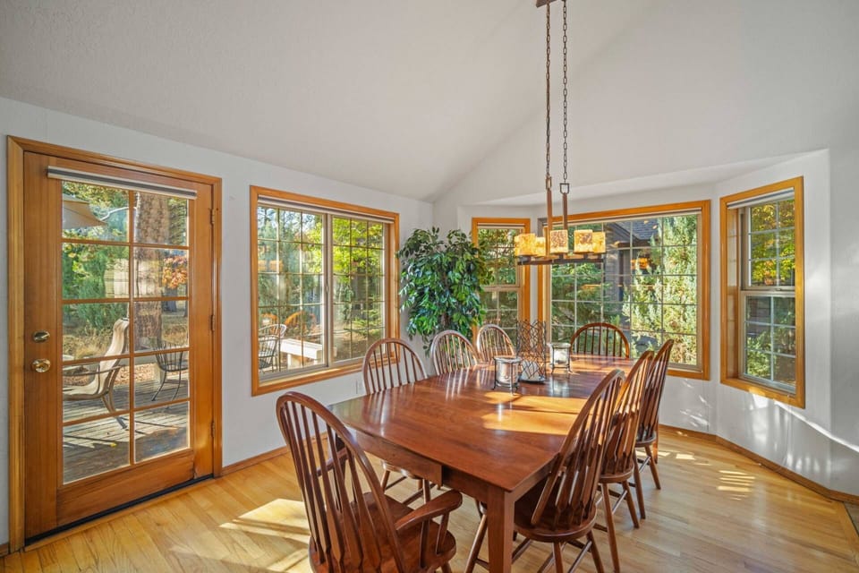 Enjoy beautiful light from the many windows in the dining room.