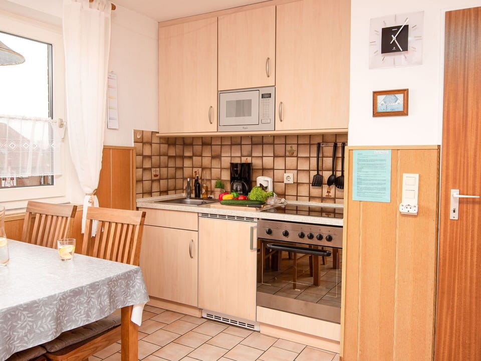 Cabinetry, Furniture, Countertop, Table, Kitchen, Wood, Chair, Kitchen Sink, Kitchen Stove, Refrigerator