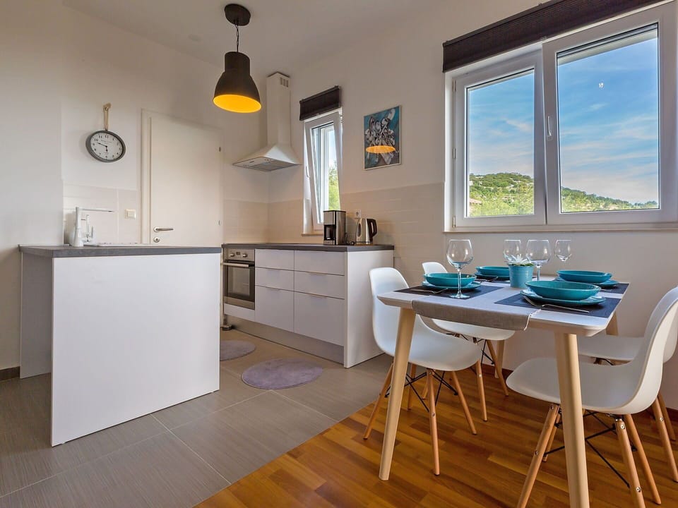 Property, Cabinetry, Furniture, Countertop, Table, Window, Chair, Wood, Lighting, Interior Design