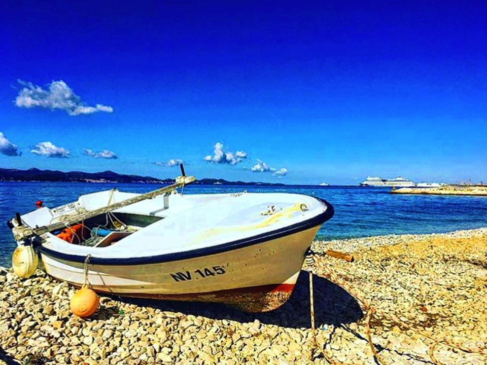 Sky, Water Transportation, Beach, Boat, Sea, Blue, Daytime, Vehicle, Cloud, Shore