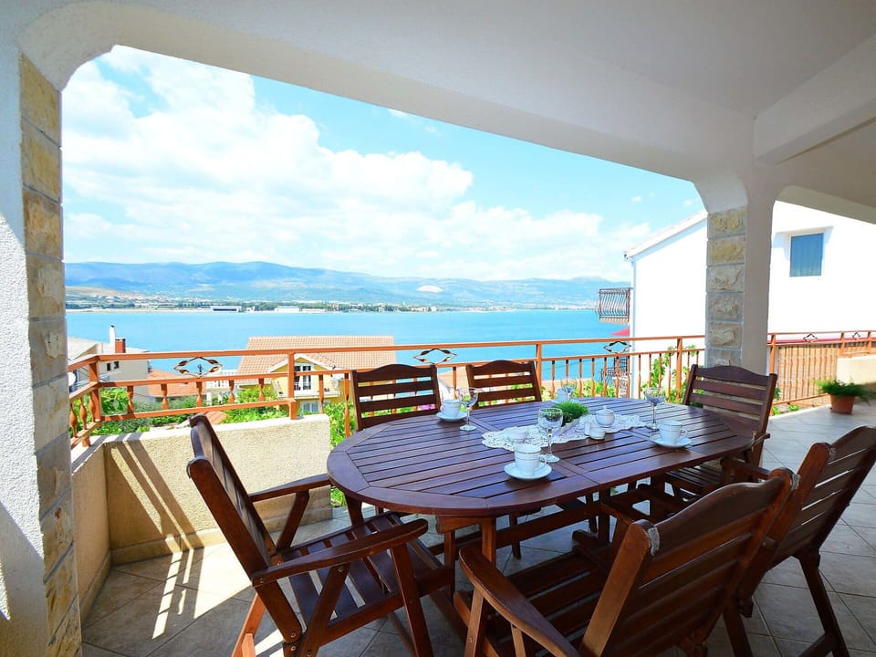Sky, Cloud, Water, Furniture, Table, Property, Chair, Building, Azure, Seaside Resort