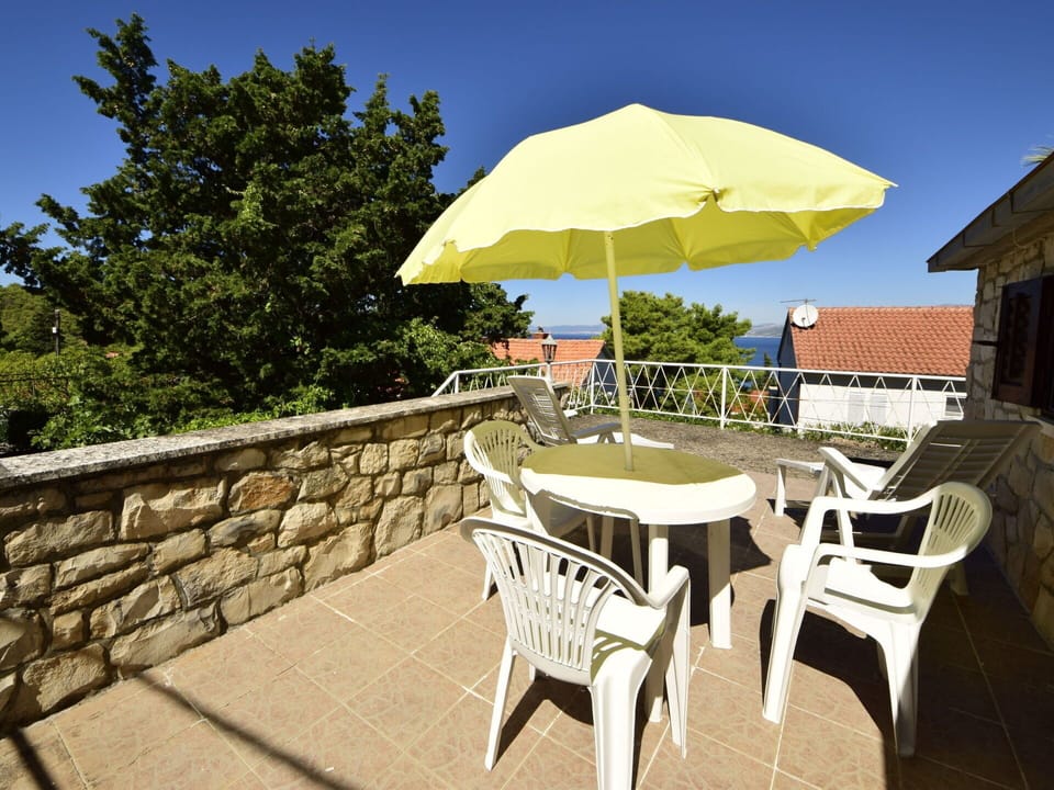 Sky, Building, Furniture, Table, Chair, Umbrella, Plant, Outdoor Table, Shade, Outdoor Furniture