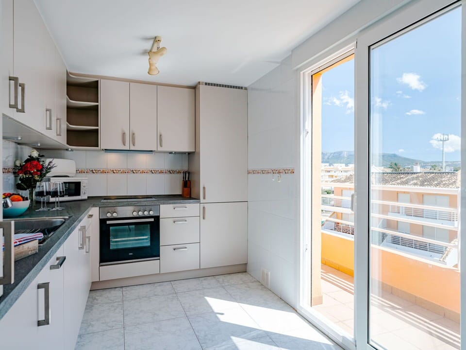 Property, Furniture, Cabinetry, Countertop, Building, Kitchen Appliance, Kitchen Stove, Wood, Window, Interior Design
