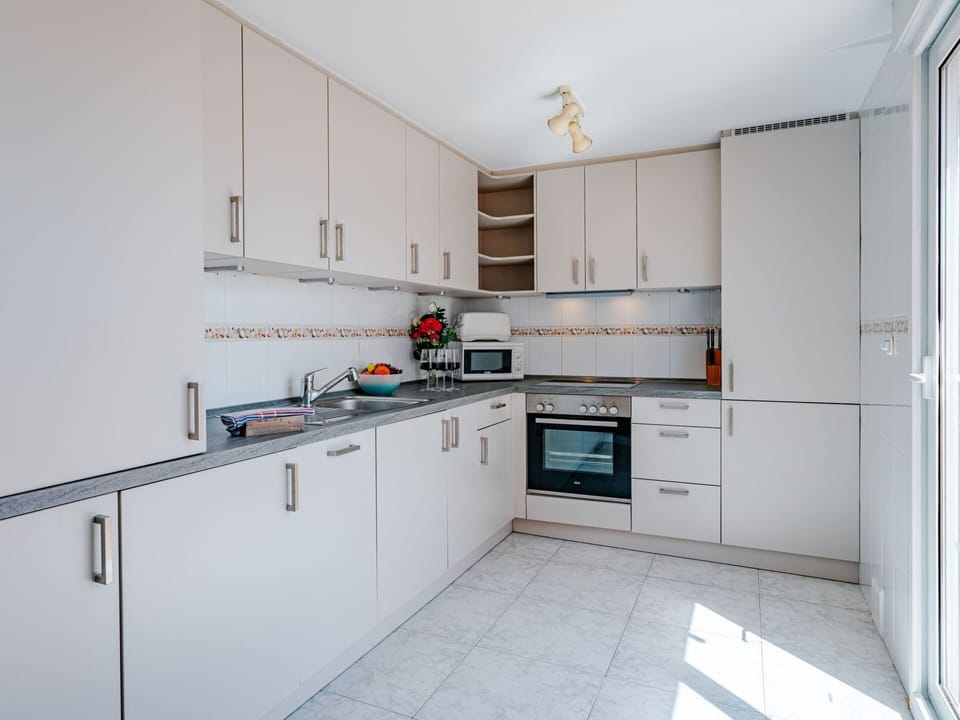 Cabinetry, Countertop, Sink, Kitchen Appliance, Kitchen Stove, Kitchen Sink, Home Appliance, Kitchen, Cooktop, Stove