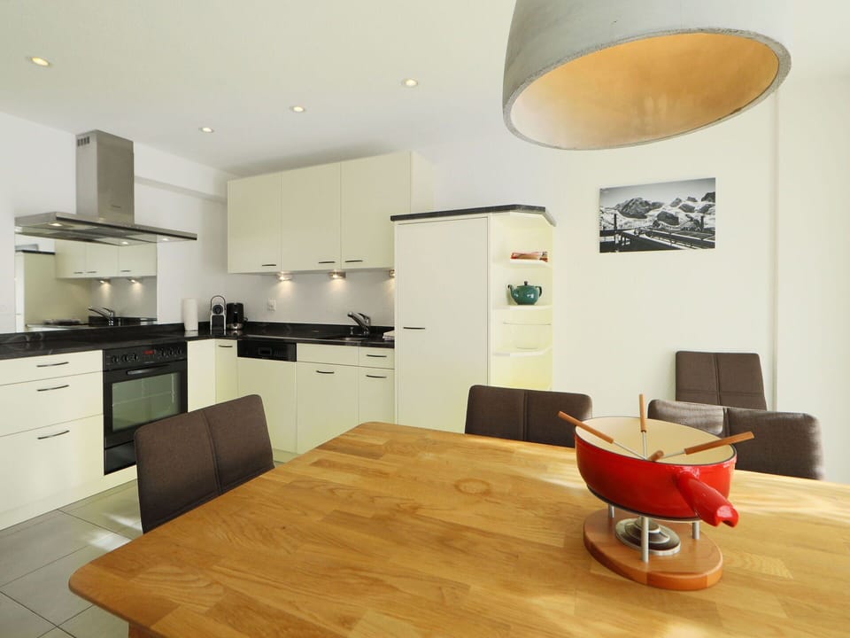 Furniture, Cabinetry, Property, Table, Countertop, Wood, Chair, Interior Design, Lighting, Flooring