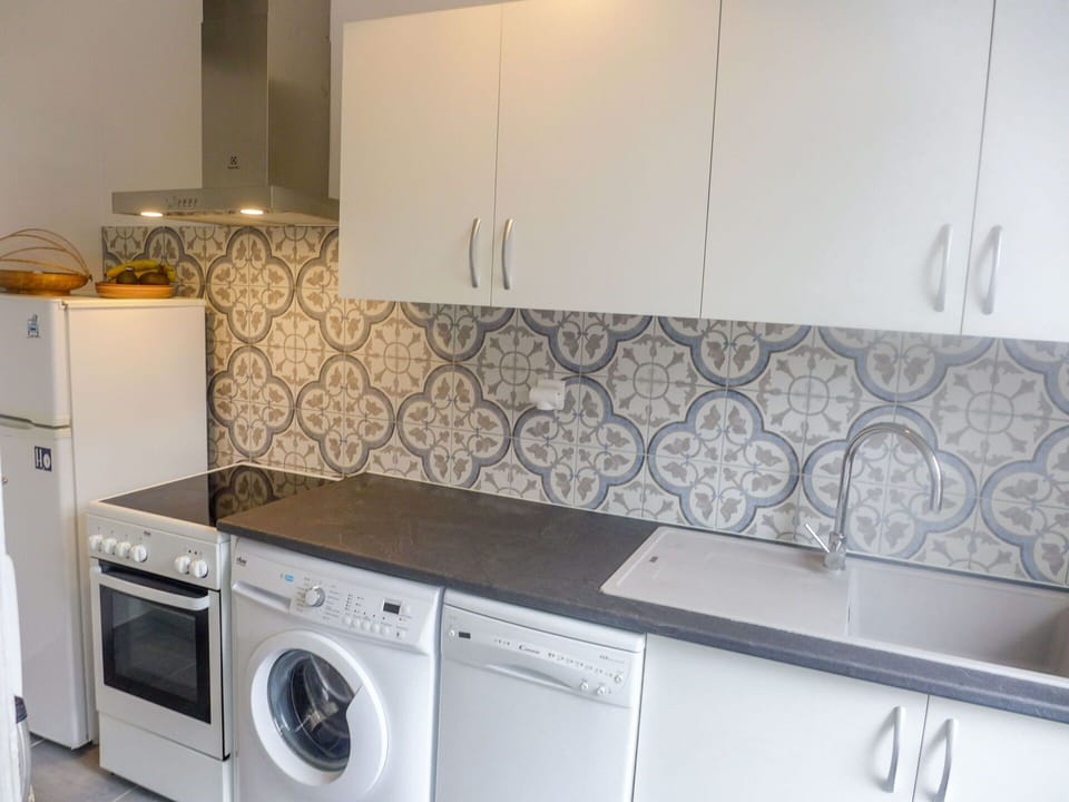 Cabinetry, Property, White, Laundry Room, Washing Machine, Kitchen Stove, Kitchen, Clothes Dryer, Interior Design, Kitchen Appliance