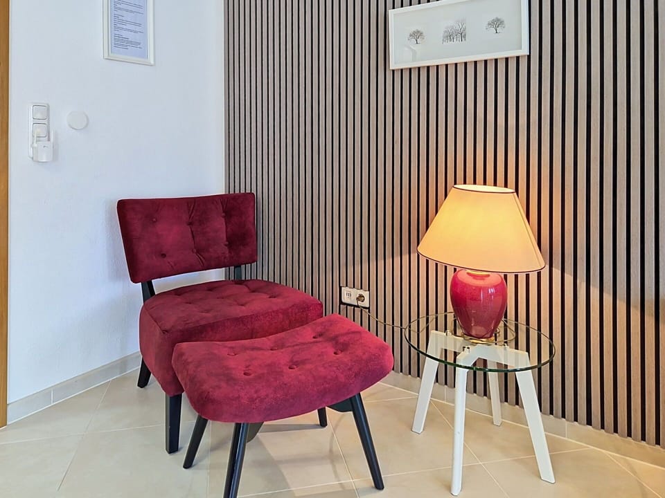 Furniture, Interior Design, Wall, Flooring, Floor, Wood, Textile, Chair, Room, Lighting