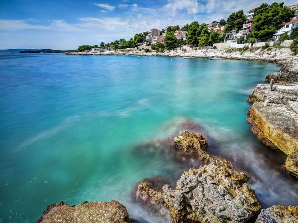 Water, Cloud, Sky, Water Resources, Blue, Azure, Natural Landscape, Coastal And Oceanic Landforms, Tree, Beach